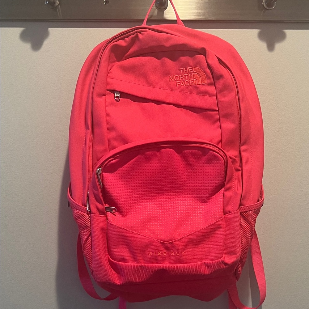 The North Face Wise Guy Backpack in Rocket Red / Atomic Pink